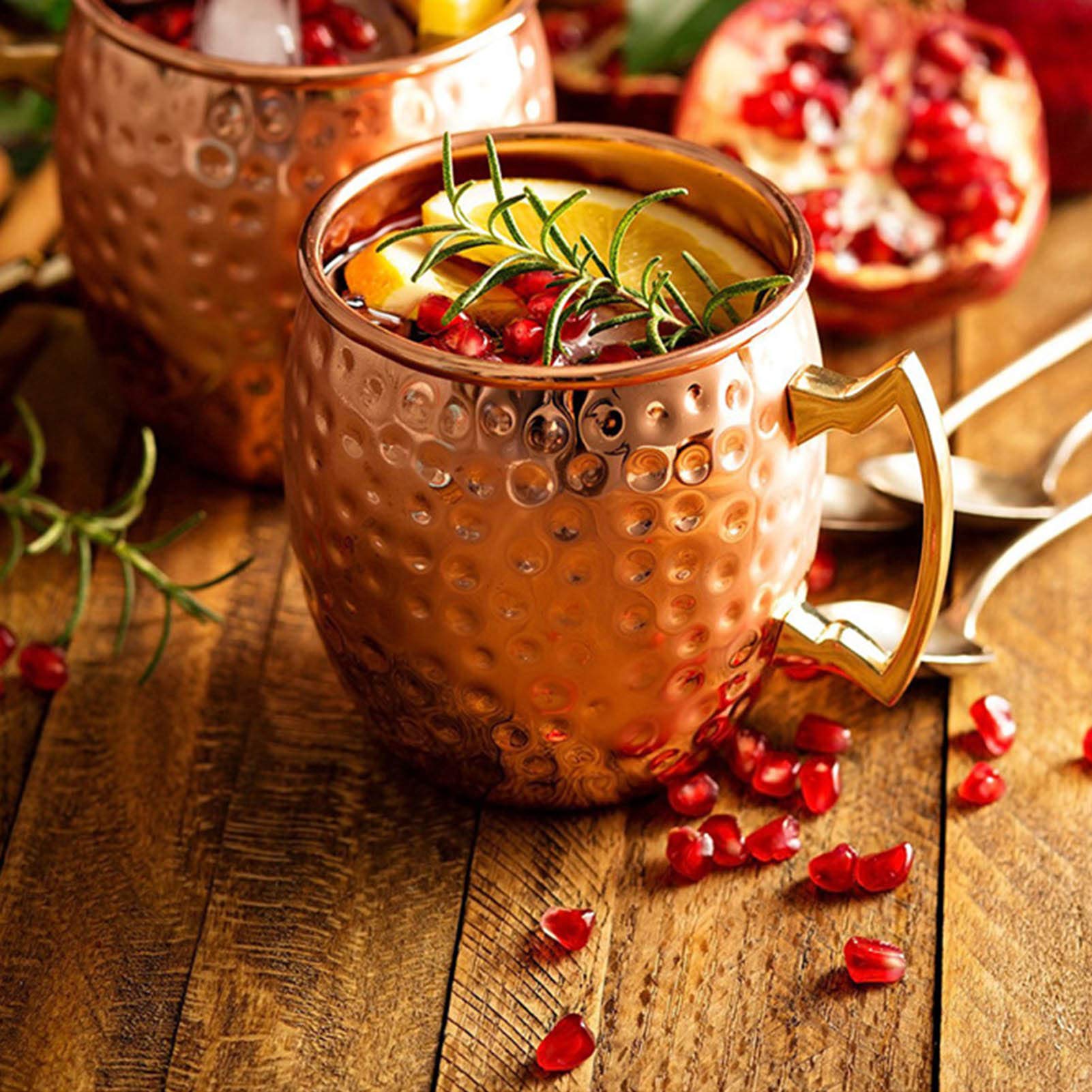 LIVEHITOP copper mugs with coasters provide a complete set for on-table cocktails.