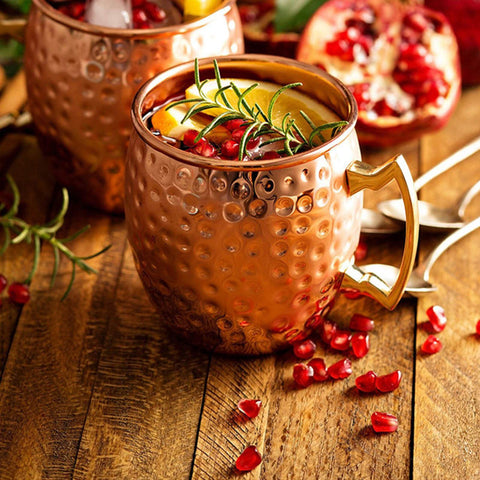 LIVEHITOP copper mugs with coasters provide a complete set for on-table cocktails.
