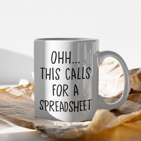 Livinges double-sided print mug designed for right- or left-handed use.