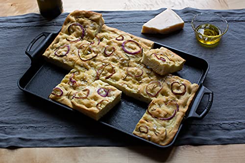 Lodge Cast Iron Baking Pan with vegetables roast demonstrates versatile oven performance.