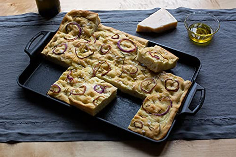 Lodge Cast Iron Baking Pan with vegetables roast demonstrates versatile oven performance.
