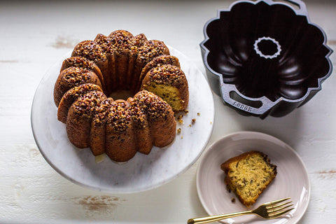 Lodge cast iron fluted cake pan in use demonstrates even browning and crisp edges.