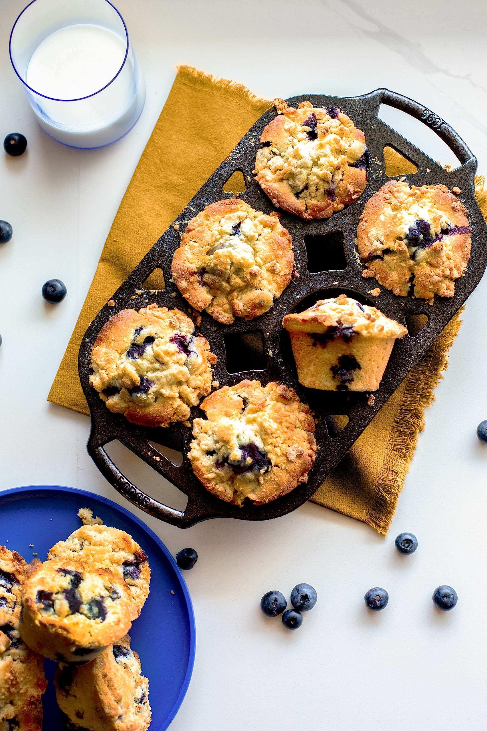 Muffins with crust and tender centers in the Lodge pan.