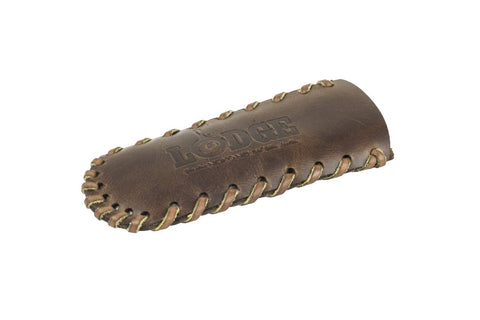 Lodge Nokona leather hot handle holder with spiral stitch for secure grip and heat protection.