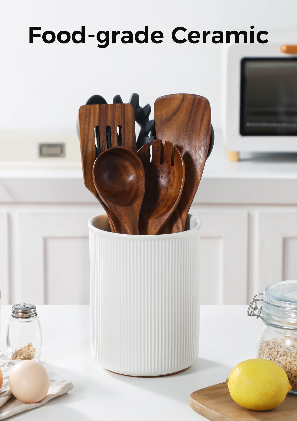Multi-use LoeJan utensil holder doubles as vase or coffee pod organizer.