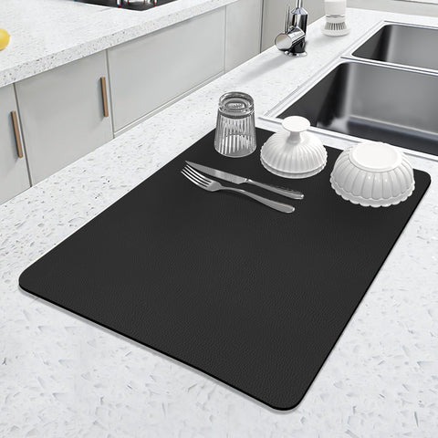LOPNUR Kitchen Drying Mat with diatomite absorbs water quickly to protect counters.