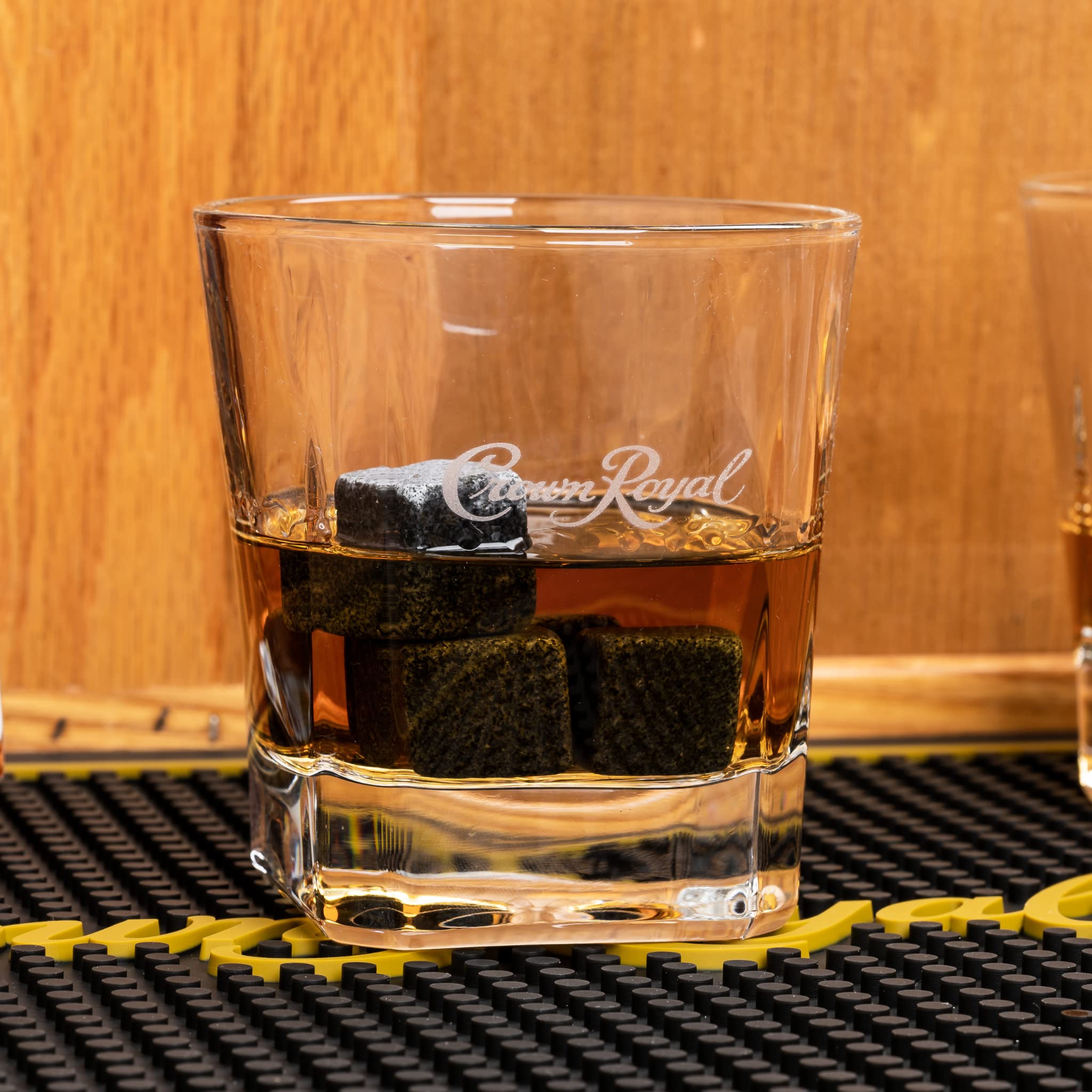 LORD'S ROCKS Crown Royal Bar Mat in use protects countertops during parties.