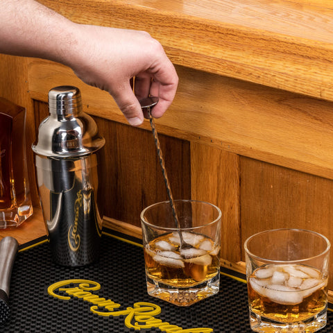 LORD'S ROCKS Crown Royal Bar Mat on counter protects surfaces during gatherings.