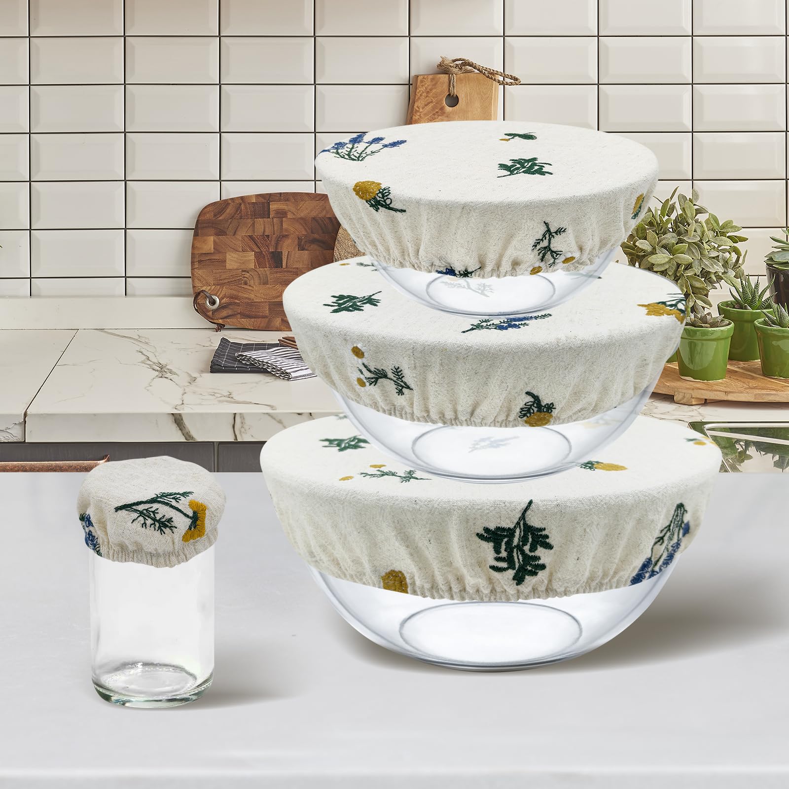Lospara beige bowl covers blend with kitchen decor while protecting fruits and salads.
