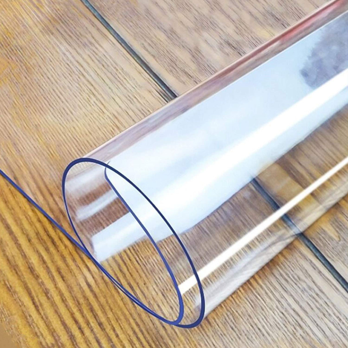 LovePads clear table cover packaged protects surfaces from spills and stains.