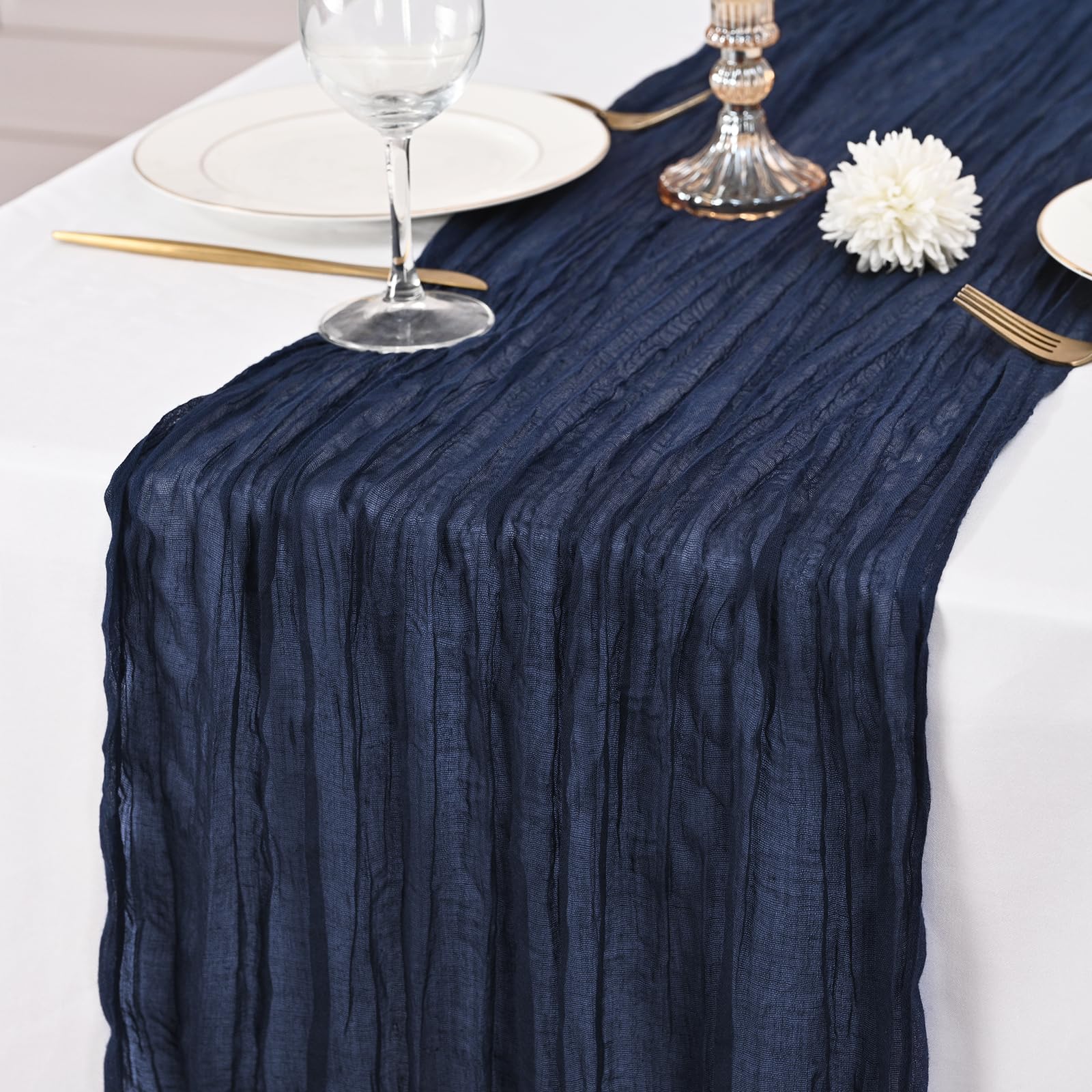 Lumaycens draped banquet runner forms an elegant backdrop for dining areas.