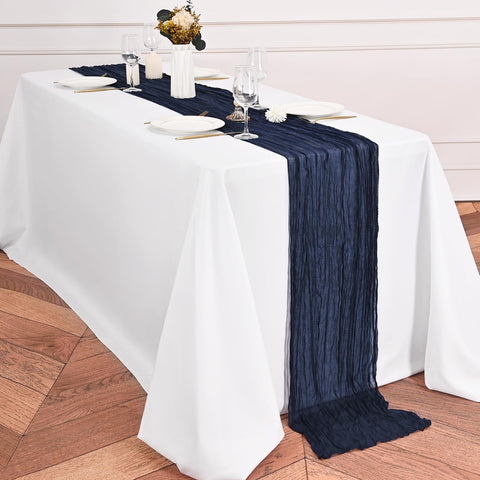 Lumaycens wrinkled gauze runner adds soft, romantic texture to tables.