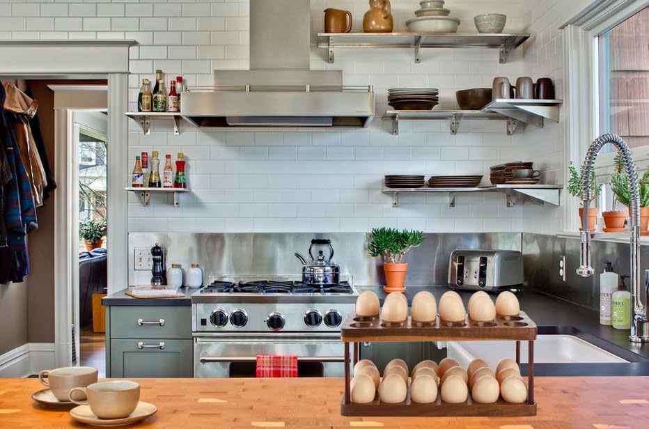 Lurockie Acacia egg rack resting on a fridge top to save counter space.
