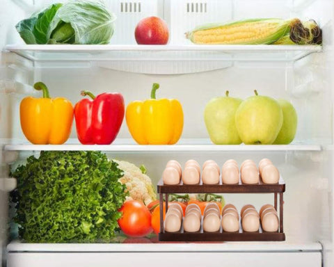 Lurockie Acacia egg tray filled with fresh eggs, neatly organized for quick access.