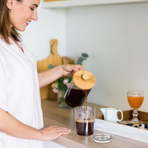 Luxfuel amber tumbler on desk, ideal for desk-side iced tea or coffee.