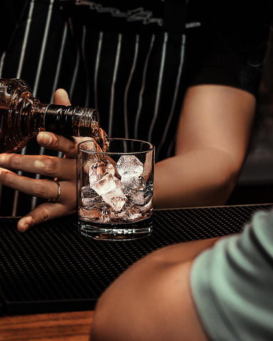 LUXU bourbon and scotch glasses highlighting crystal sparkle at the table