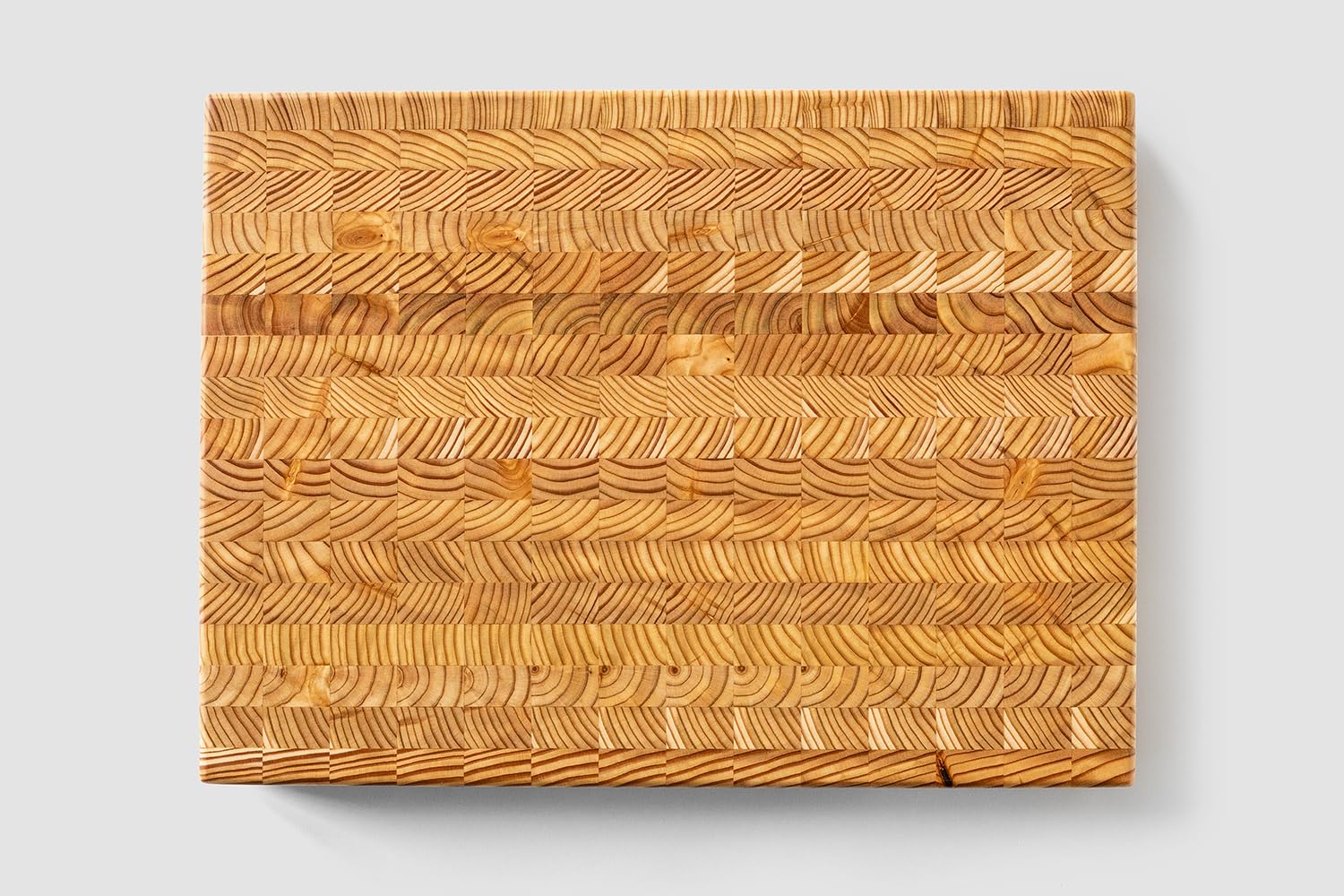 LW Handmade Larch Wood Canada end grain medium cutting board side view, stable and slip resistant