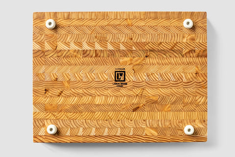 LW Handmade Larch Wood Canada end grain medium cutting board close up shows natural color variations