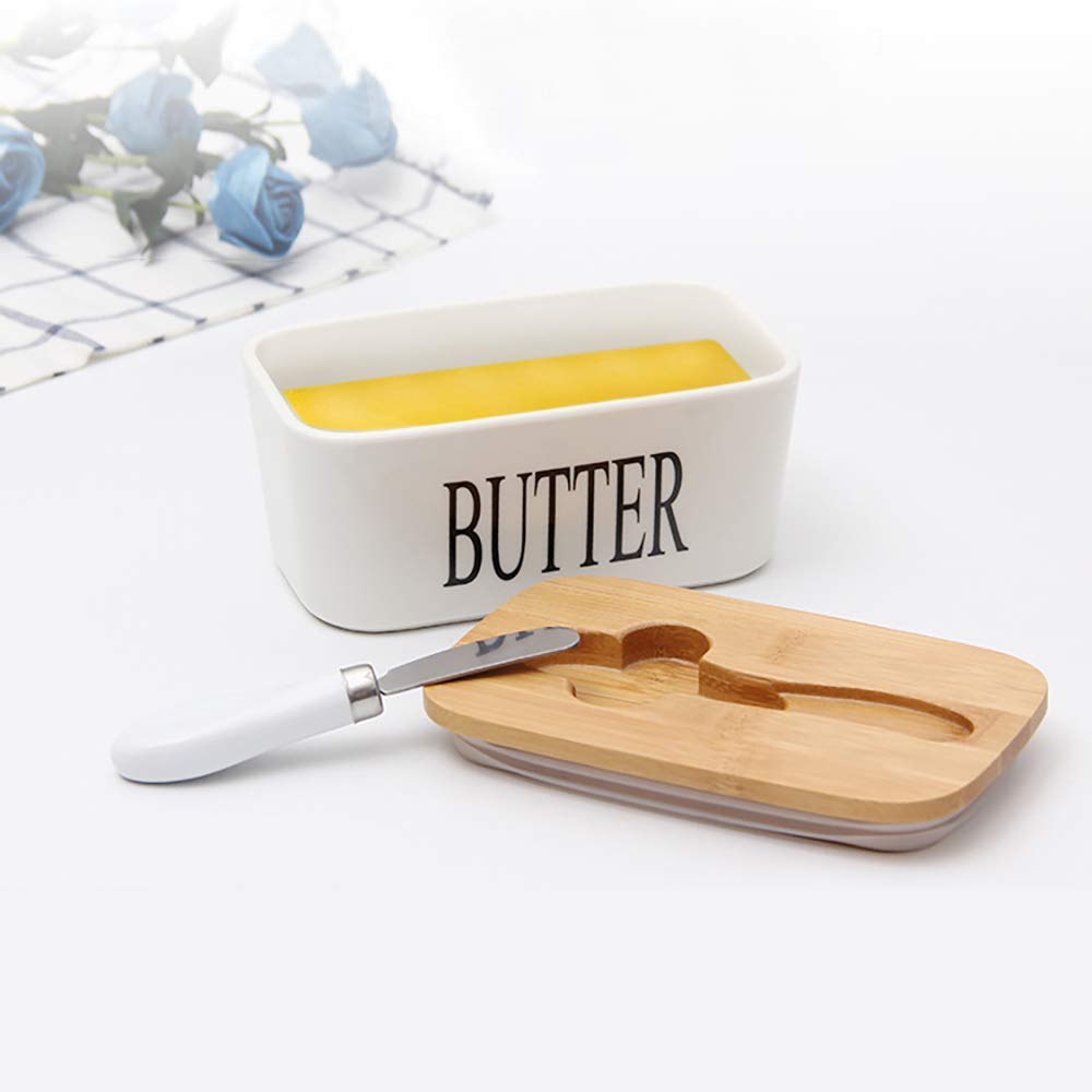 Lxmons butter dish on a counter displaying farmhouse decor
