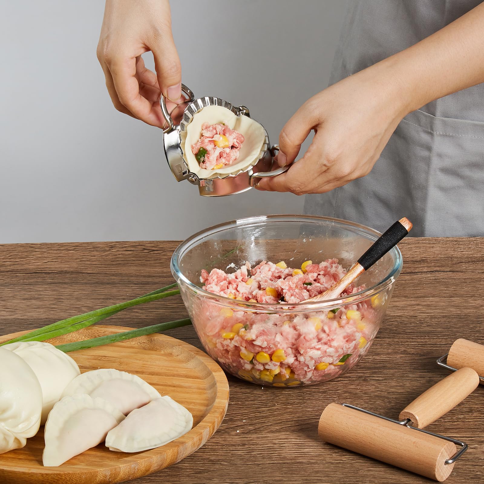 MacaRio dumpling press maker helps form uniform pockets for fillings.
