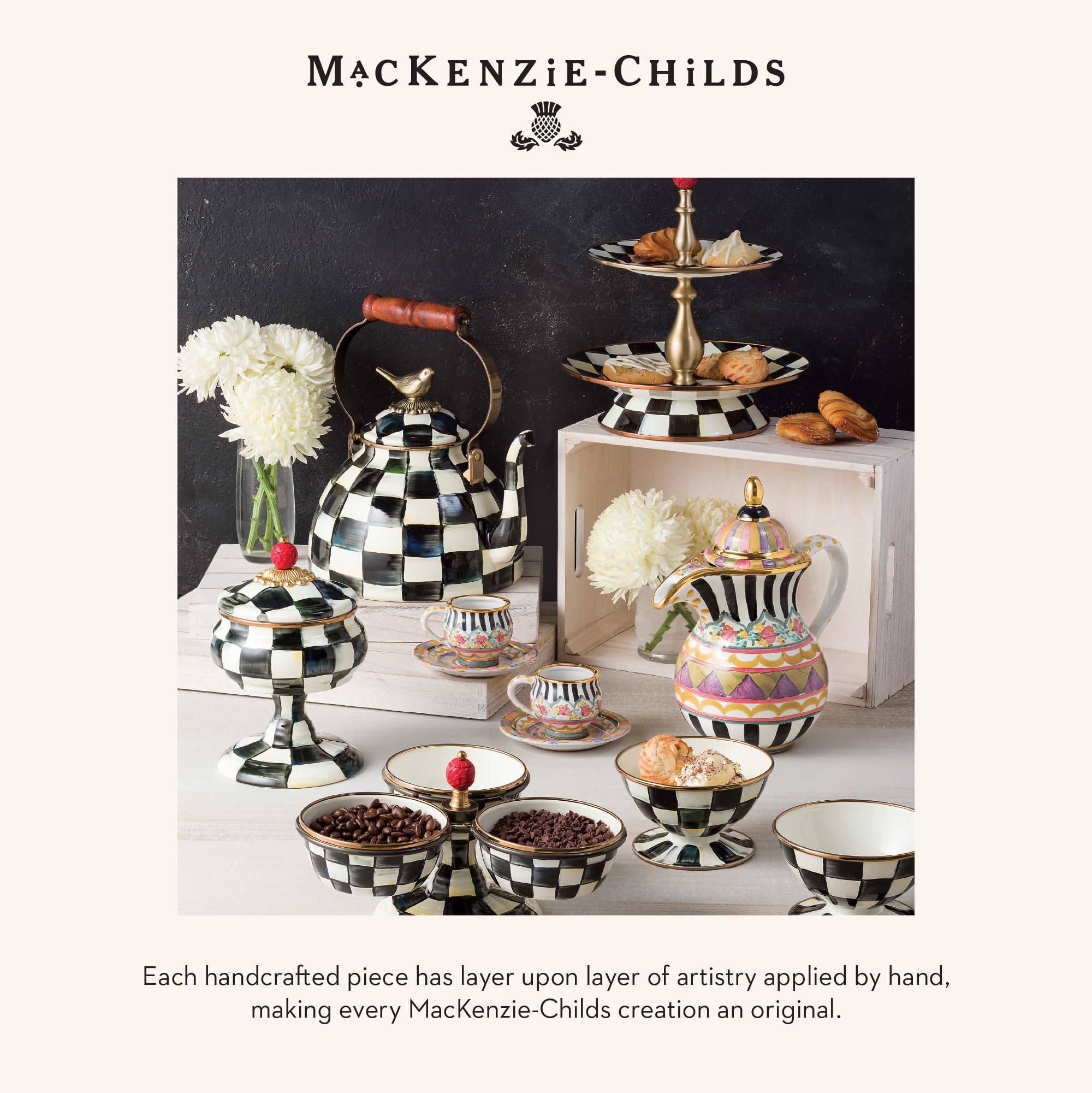 Boxed MacKenzie-Childs salt and pepper set ready for gifting.