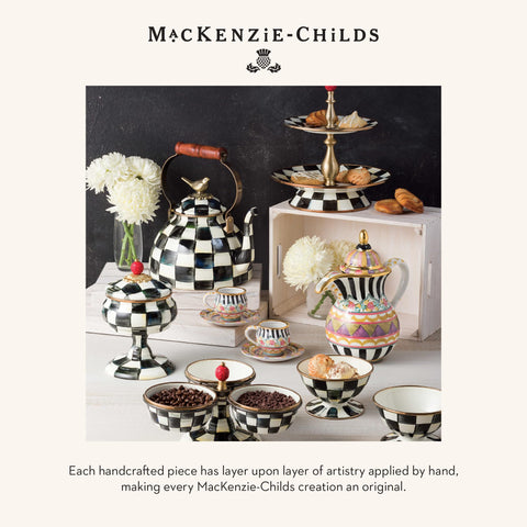 Boxed MacKenzie-Childs salt and pepper set ready for gifting.