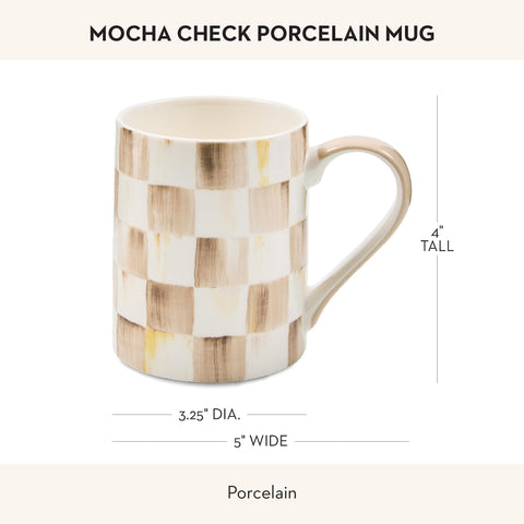 MacKenzie-Childs mug with solid brown handle.