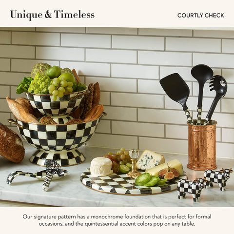 MacKenzie-Childs Cheese Course hand-glazed underbody offers sturdy, premium quality.