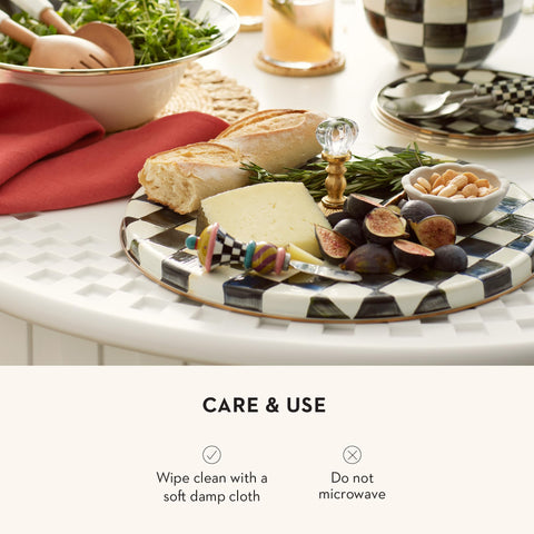 MacKenzie-Childs Cheese Course serving board doubles as a charming home decor piece.