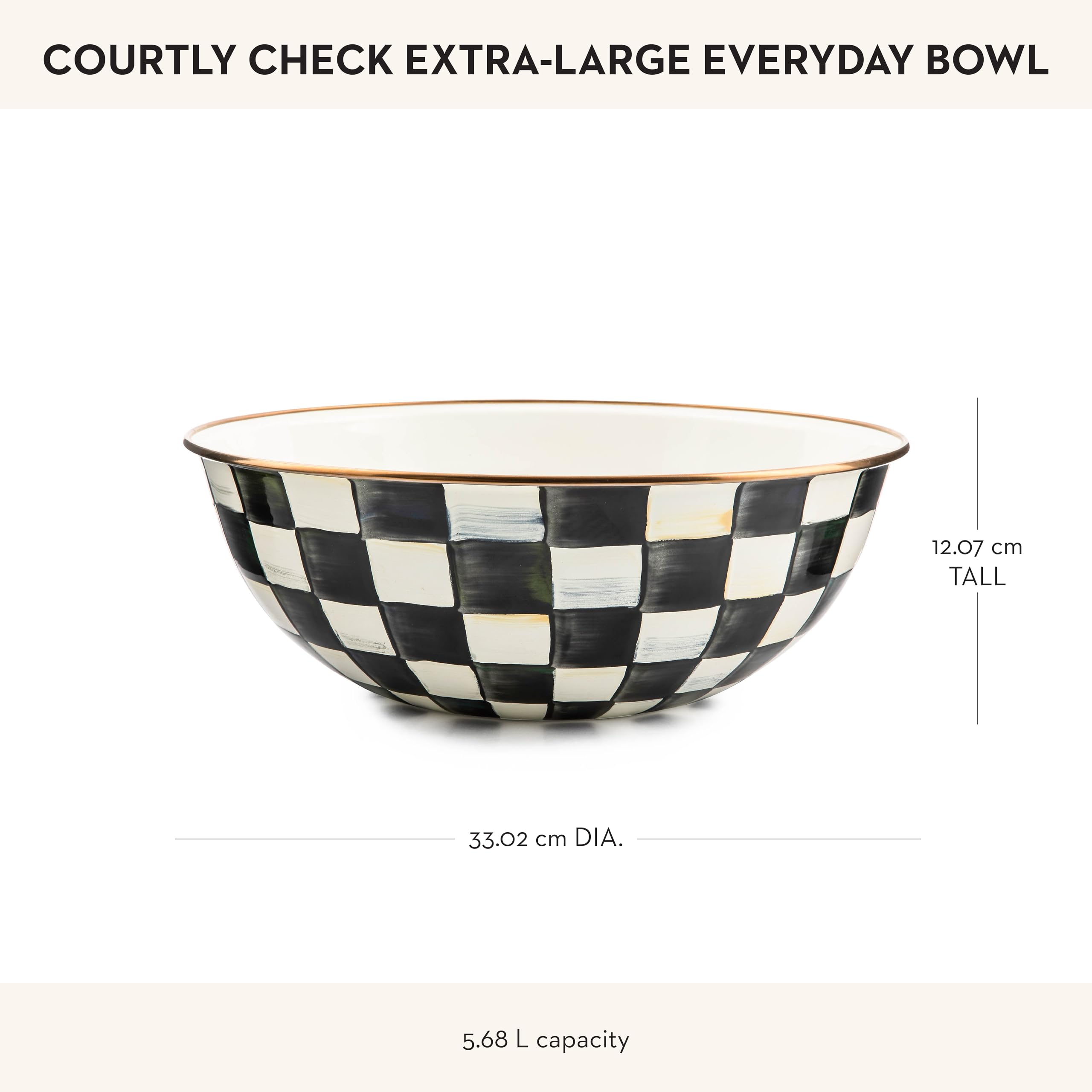 MacKenzie-Childs Courtly Check bowl displayed empty on a dining table.