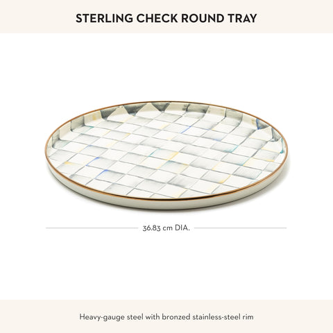 MacKenzie-Childs enamel round tray with steel underbody provides sturdy support.