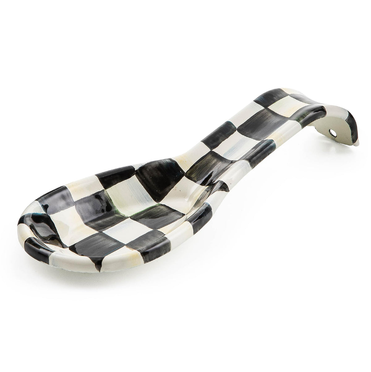 MacKenzie-Childs enamel spoon rest in Courtly Check on counter keeps utensils tidy.