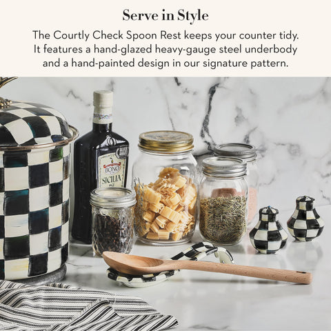 MacKenzie-Childs spoon rest on stovetop adds elegant organization.