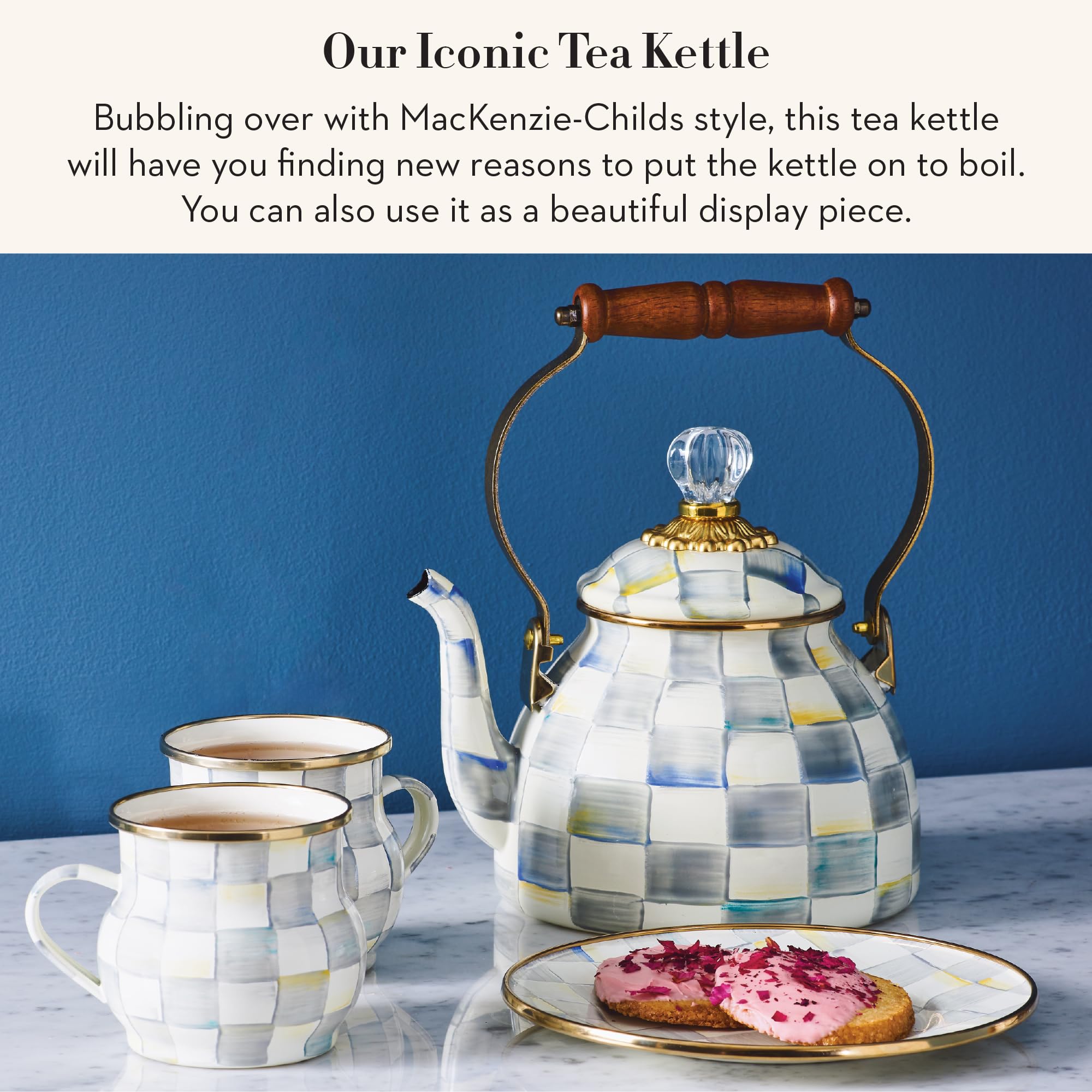 MACKENZIE-CHILDS enamel tea kettle with wooden handle for a comfortable grip and classic style