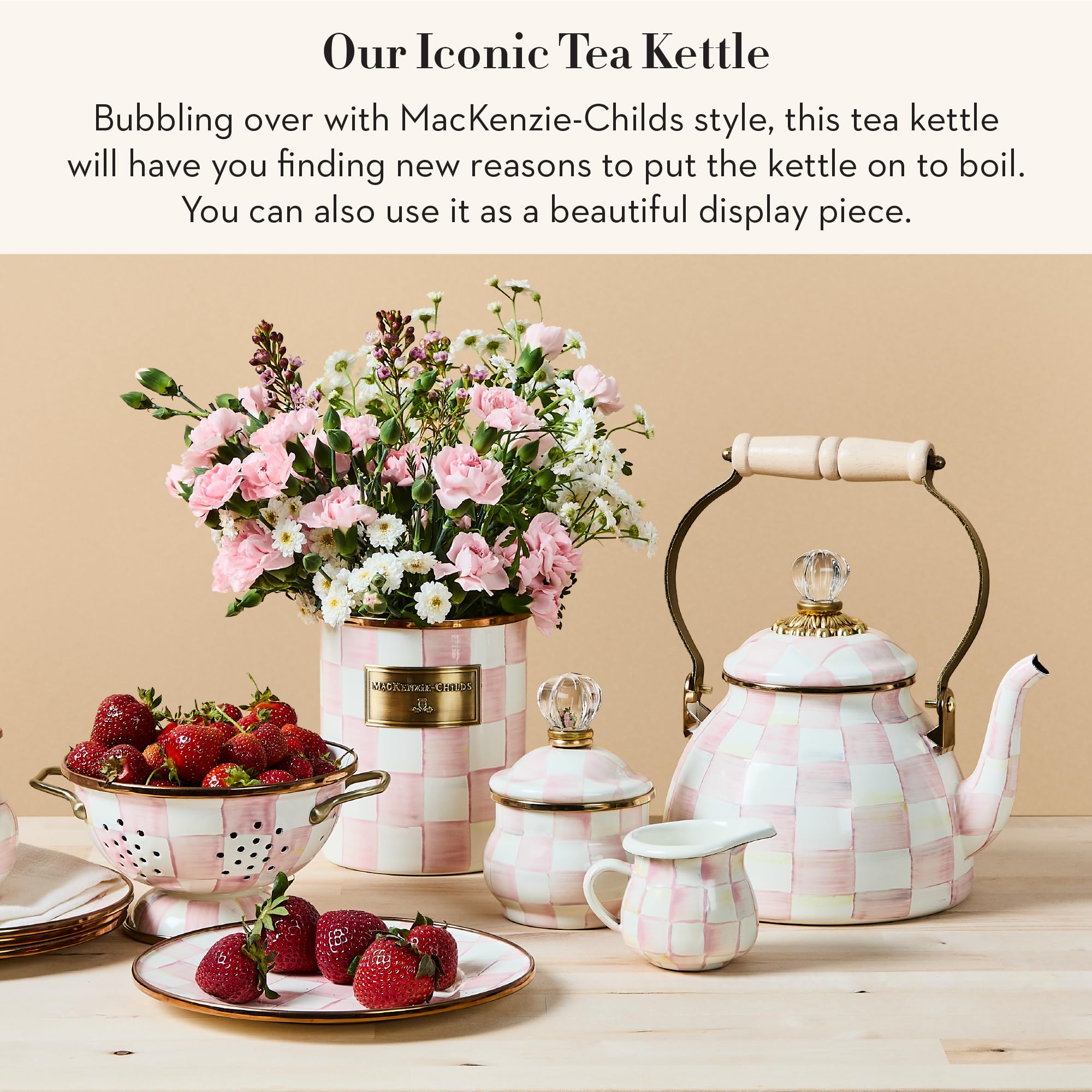 Mackenzie-Childs enamel tea kettle with wood handle offers comfortable pouring