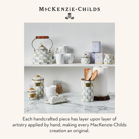 MACKENZIE-CHILDS Sterling Check utensil holder on a tidy counter, decorative storage.