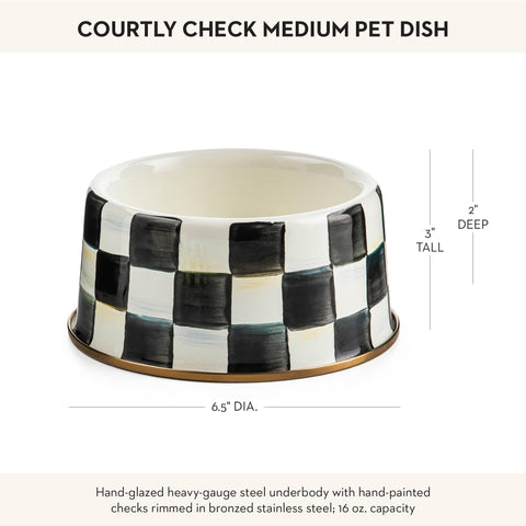 Mackenzie-Childs hand-painted glossy checks add decorative flair to meals.