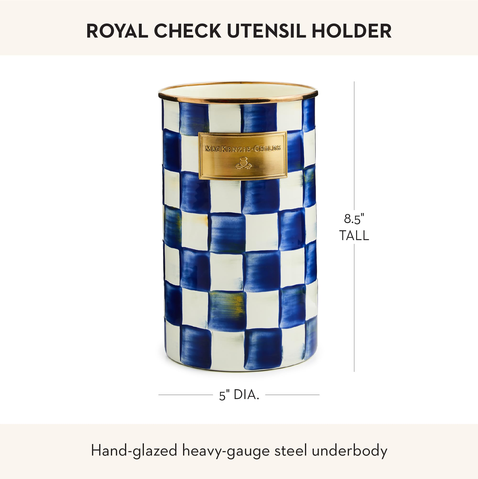 MacKenzie-Childs enamel utensil holder complements blue-and-white kitchen decor.