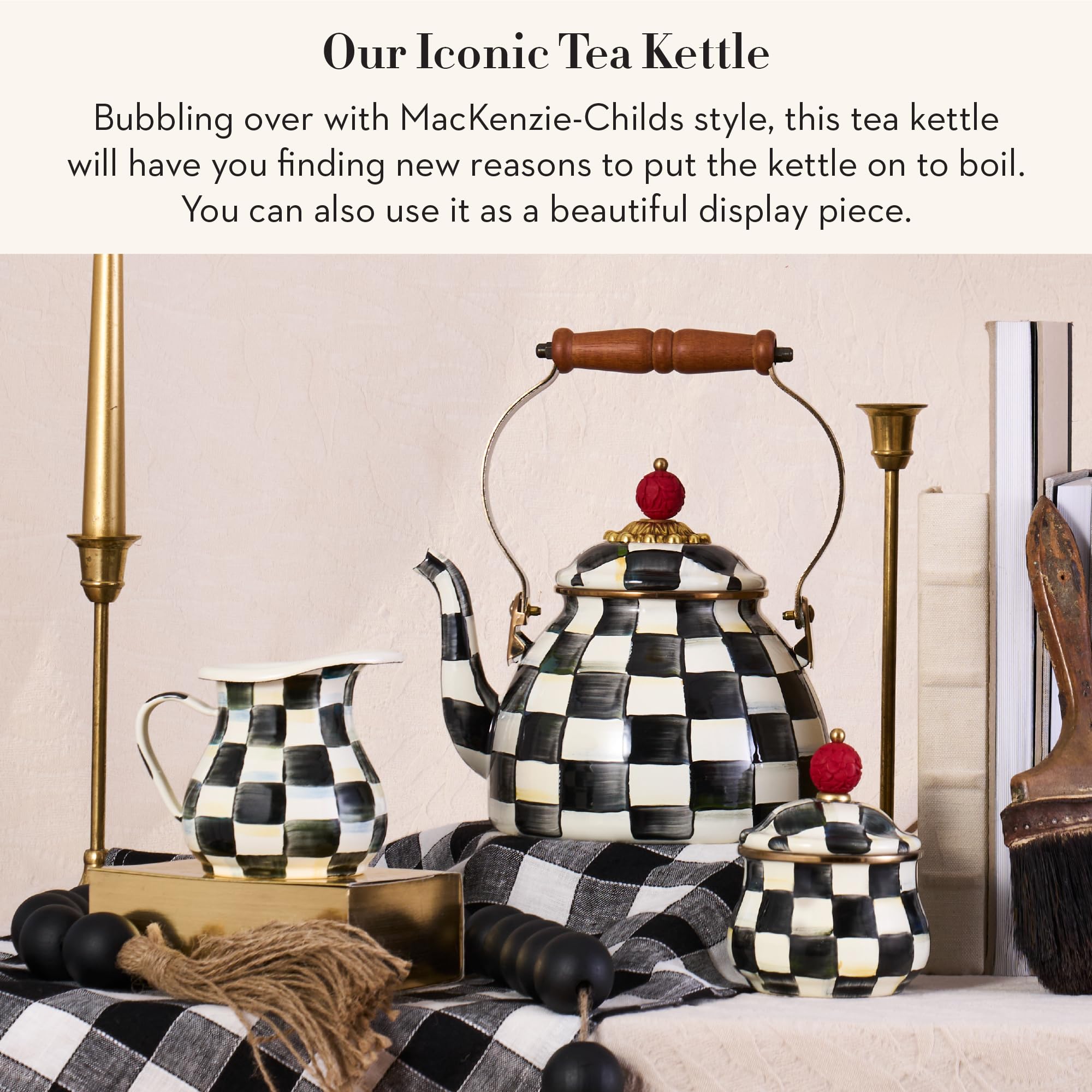 MACKENZIE-CHILDS kettle with wood handle provides comfortable grip during pouring