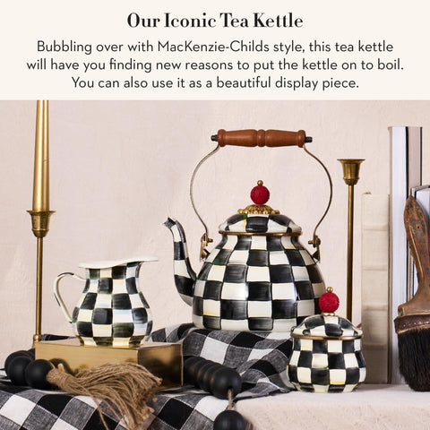 MACKENZIE-CHILDS kettle with wood handle provides comfortable grip during pouring