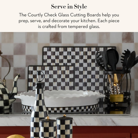 MACKENZIE-CHILDS cutting board used as cheese palette on stylish counter