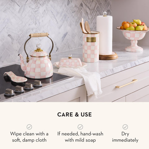 Close-up of MacKenzie-Childs Rosy Check enamel finish for durable storage