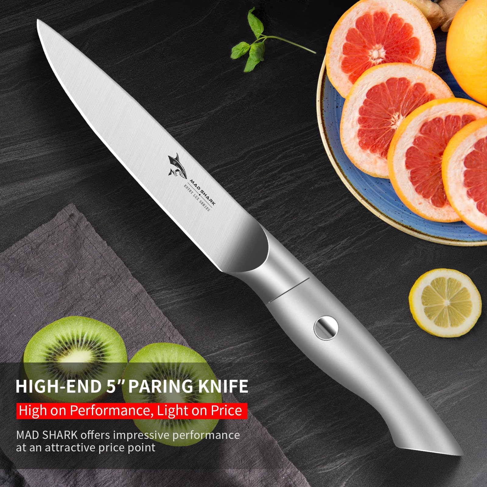MAD SHARK paring knife in hand enables clean, controlled fruit slicing.