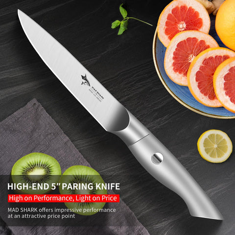 MAD SHARK paring knife in hand enables clean, controlled fruit slicing.