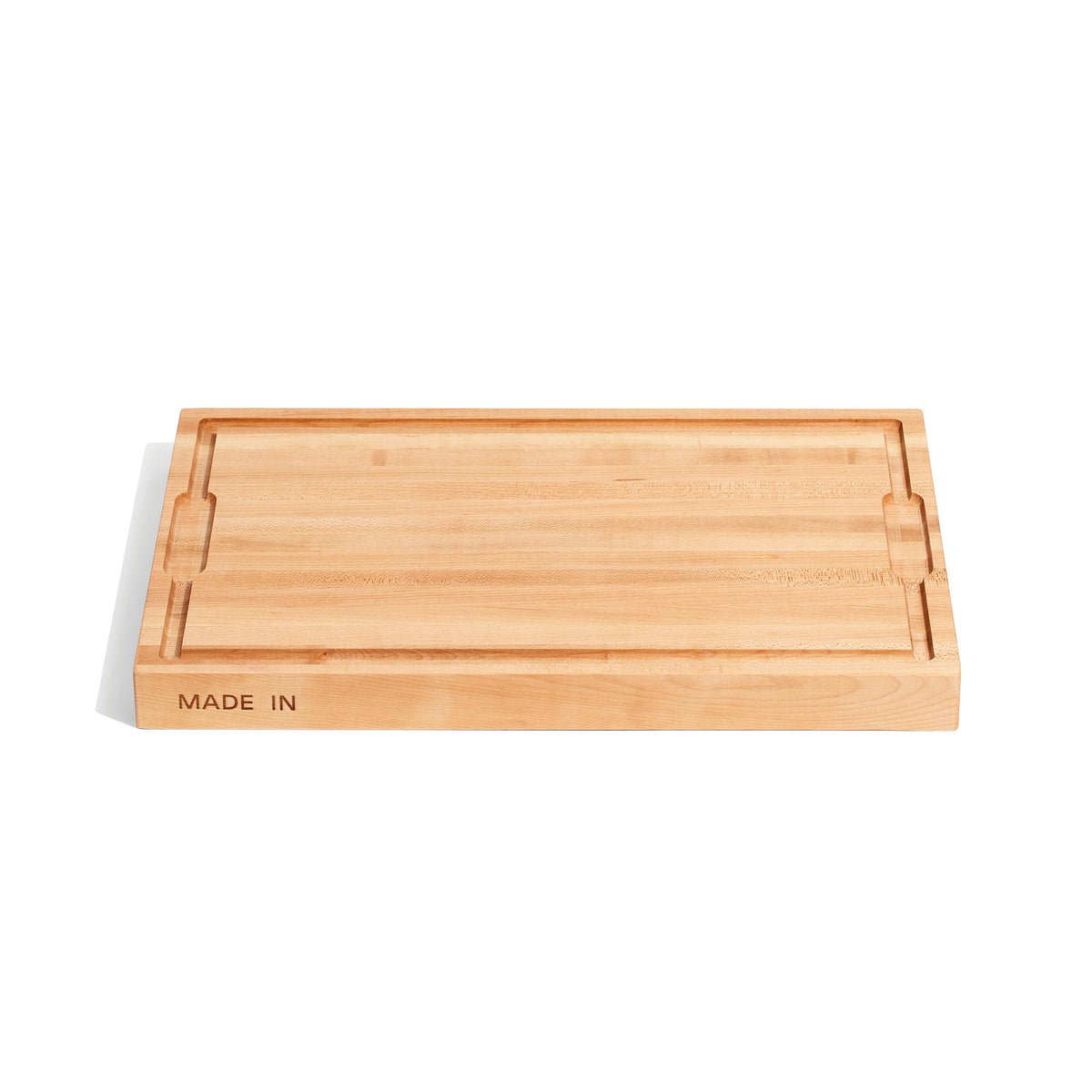 Made In butcher block maple edge-grain top view for sturdy cutting and serving.