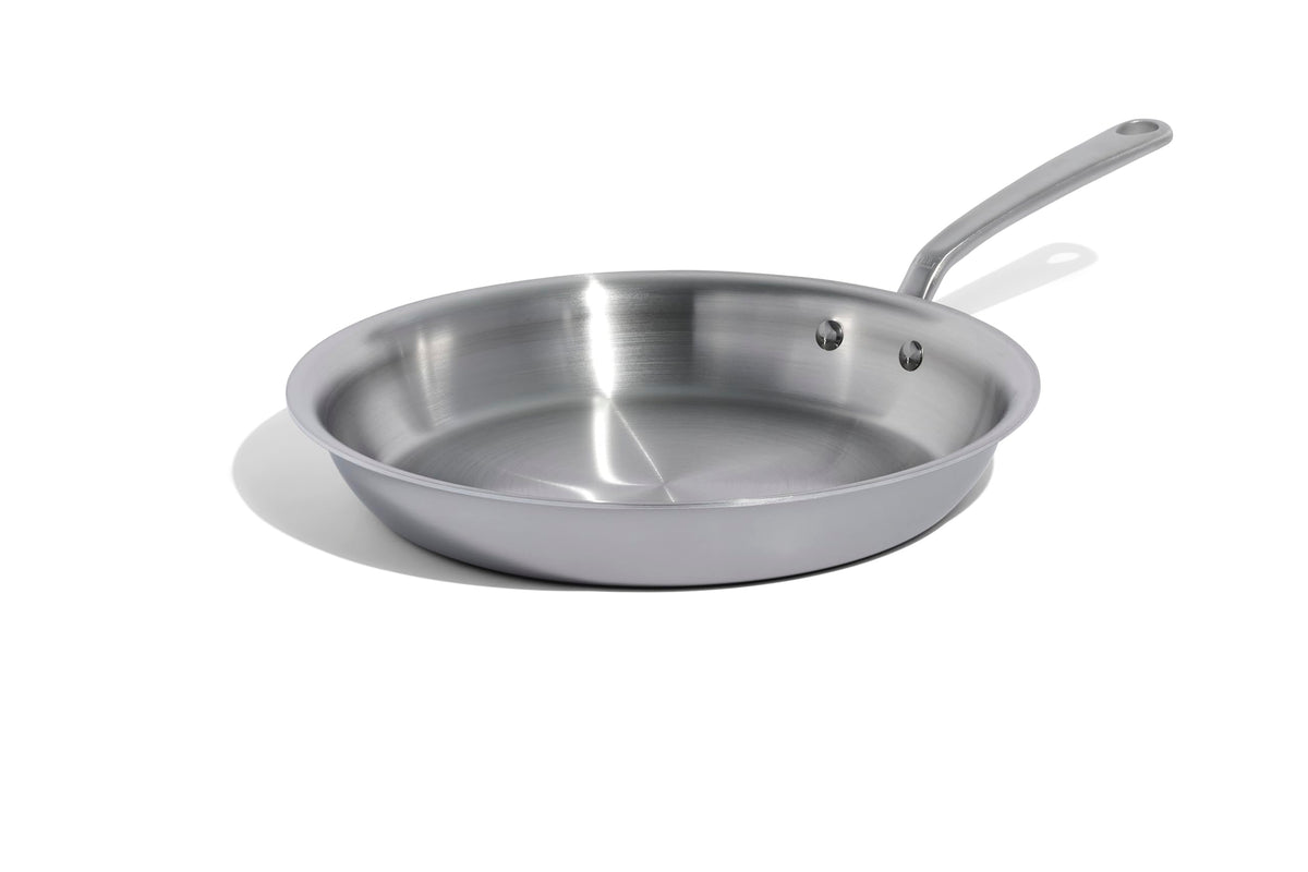 Made In 12-inch stainless clad frying pan with expansive cooking surface for even searing.