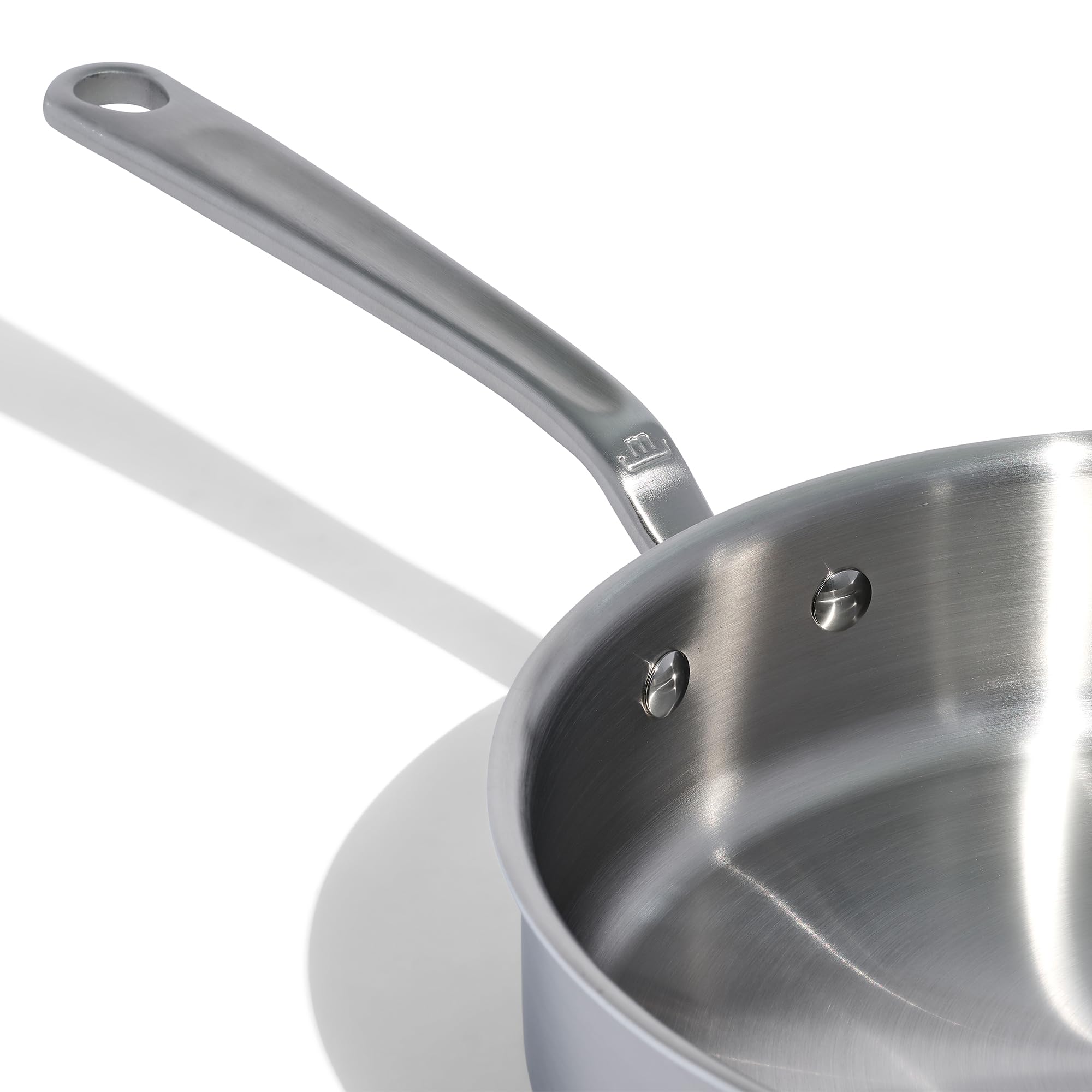Made In 3.5-quart saute pan handle close-up showing stay-cool grip.