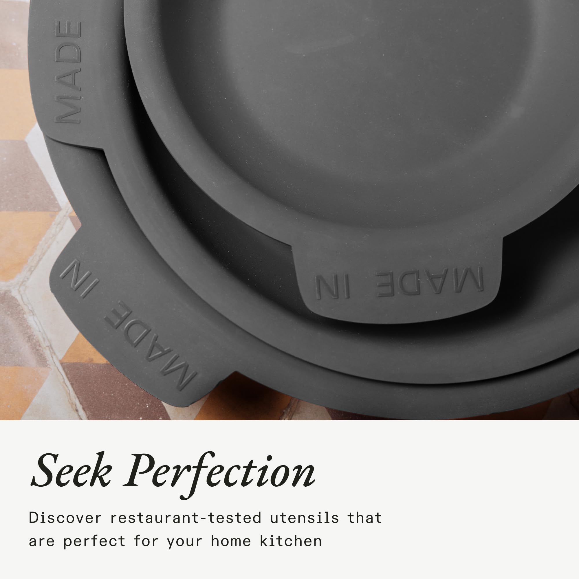 Made In graphite silicone stack protector cushions pans during stacking.