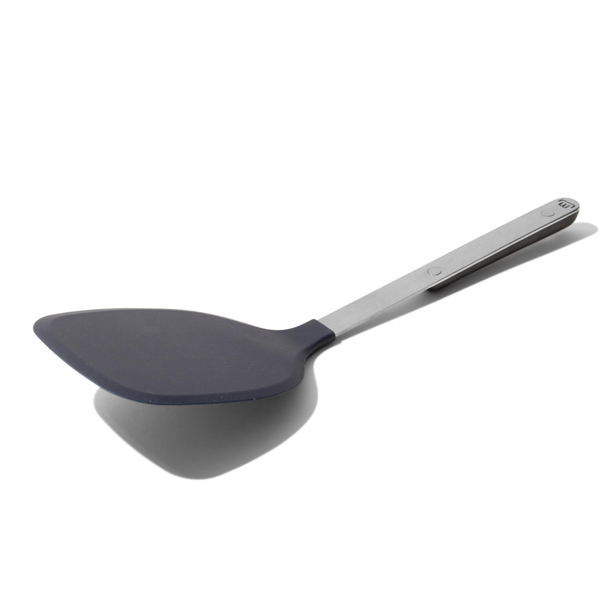 Made In Harbour Blue rubber spatula head closeup for gentle nonstick flipping.