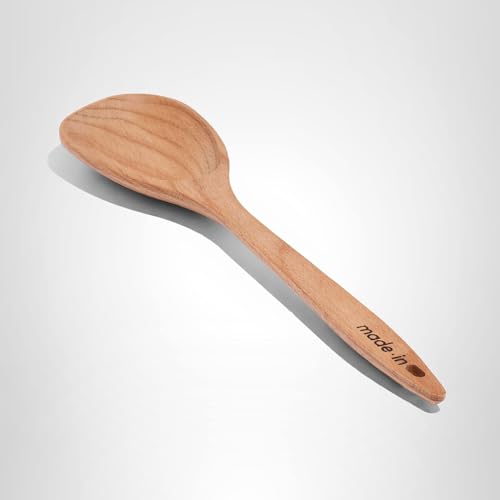 Made In wooden spoon in action, ideal for stirring and tossing